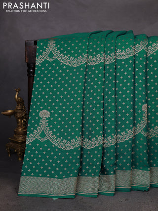 Banarasi crepe saree peacock green and pink with allover butta weaves and woven border