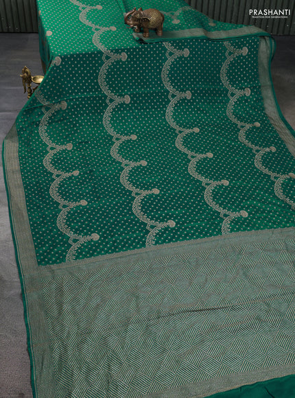 Banarasi crepe saree peacock green and pink with allover butta weaves and woven border