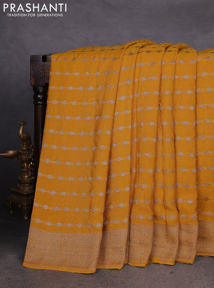 Banarasi crepe saree mustard yellow with allover geometric weaves and woven border