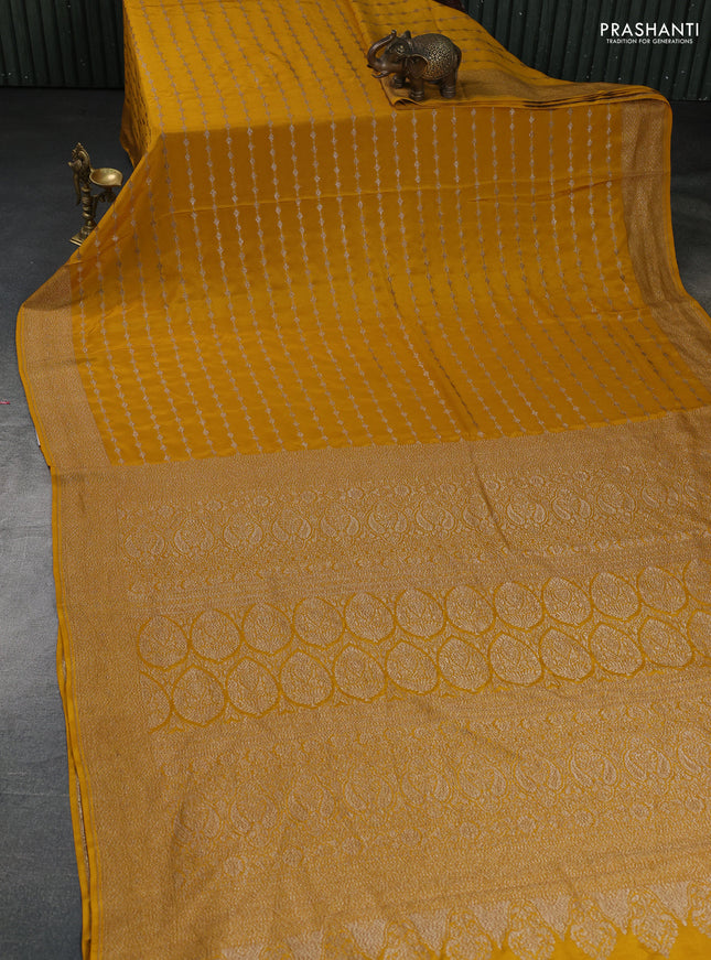 Banarasi crepe saree mustard yellow with allover geometric weaves and woven border