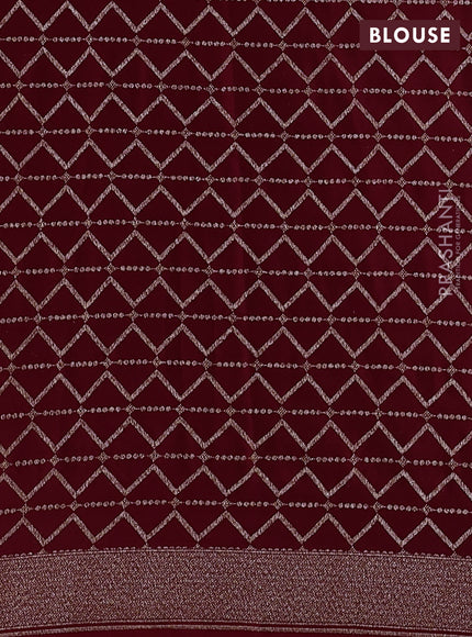 Banarasi crepe saree maroon with allover geometric weaves and woven border