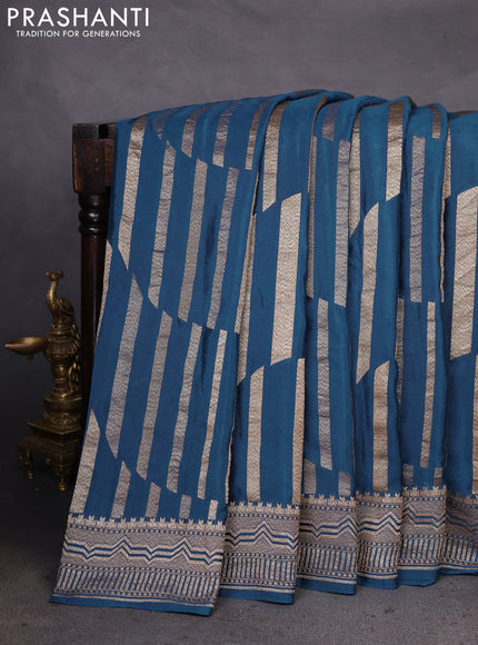 Banarasi crepe saree peacock blue with allover geometric weaves and woven border