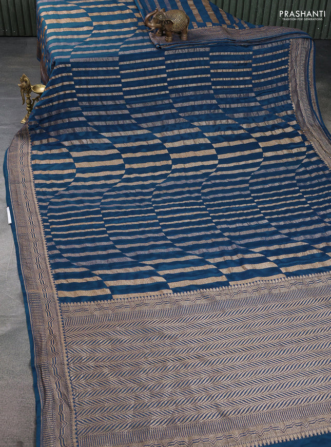Banarasi crepe saree peacock blue with allover geometric weaves and woven border