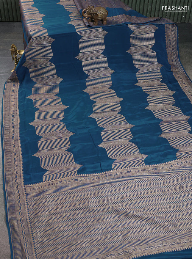 Banarasi crepe saree peacock blue with allover geometric weaves and woven border