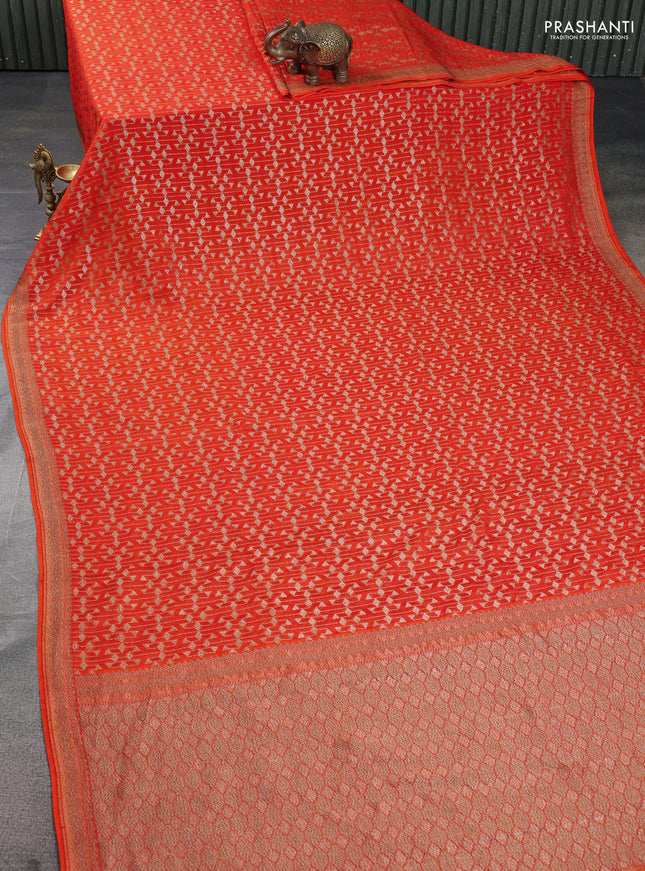 Banarasi crepe saree orange with allover geometric weaves and woven border