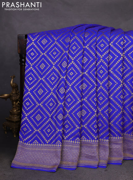 Banarasi crepe saree blue with allover geometric weaves and woven border