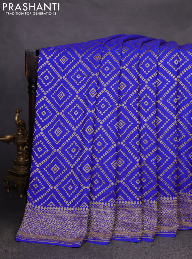 Banarasi crepe saree blue with allover geometric weaves and woven border