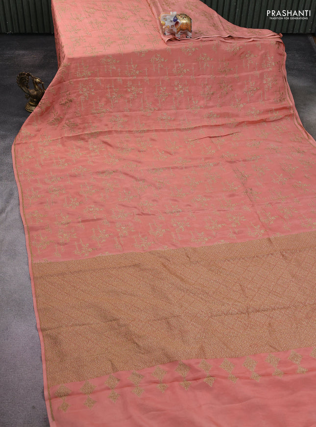 Banarasi crepe saree peach shade with woven buttas in borderless style