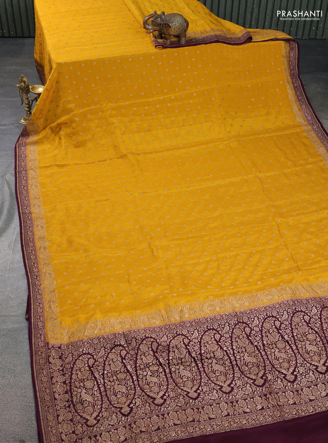 Banarasi crepe saree mustard yellow and wine shade with woven buttas and woven border