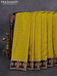 Banarasi crepe saree lime yellow and black with woven buttas and woven border