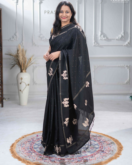 Semi tussar saree black with zari woven buttas and zari woven embroidery butta border