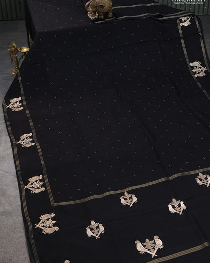 Semi tussar saree black with zari woven buttas and zari woven embroidery butta border
