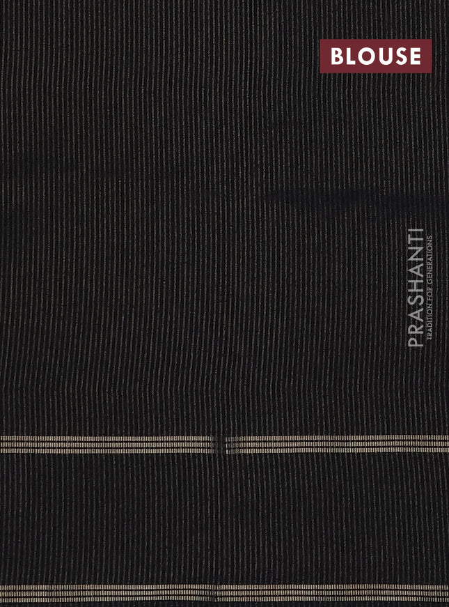 Semi tussar saree black with zari woven buttas and zari woven embroidery butta border