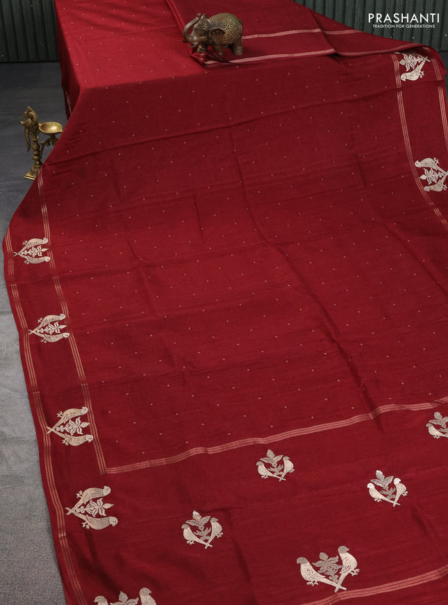 Semi tussar saree maroon with zari woven buttas and zari woven embroidery butta border