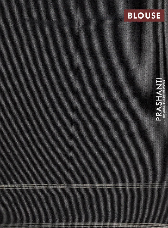 Semi tussar saree black with zari woven buttas and zari woven embroidery butta border