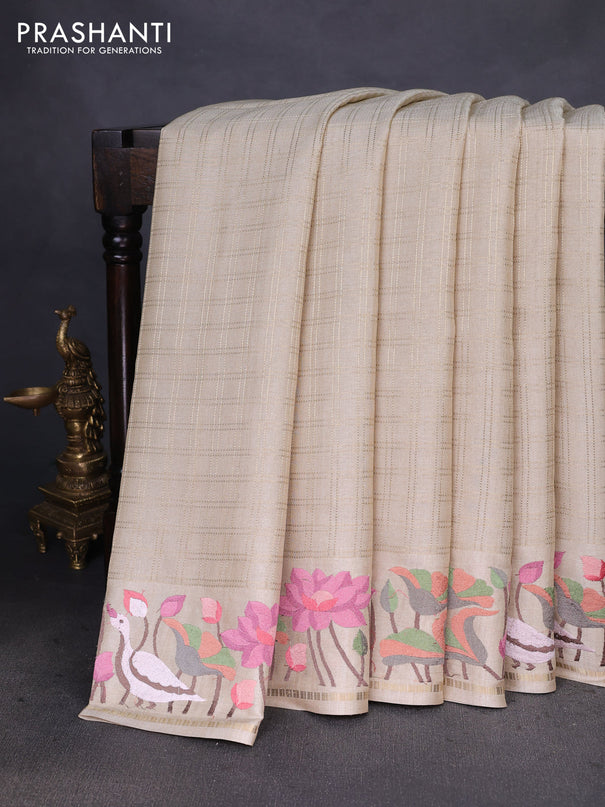 Semi tussar saree sandal with allover zari checked pattern and embroidery border