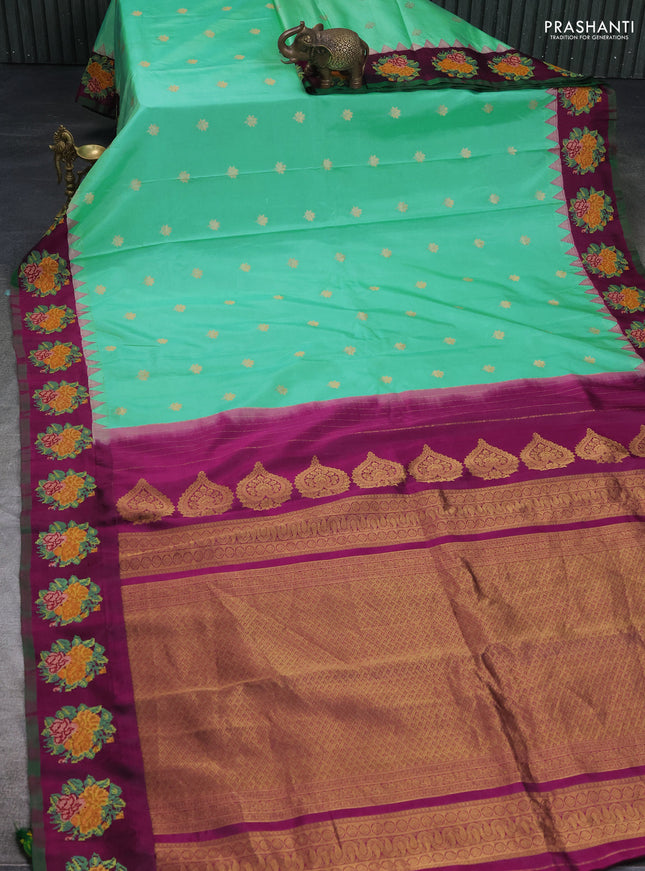 Pure gadwal silk saree teal green and purple with zari woven buttas and temple design convent embroidery border
