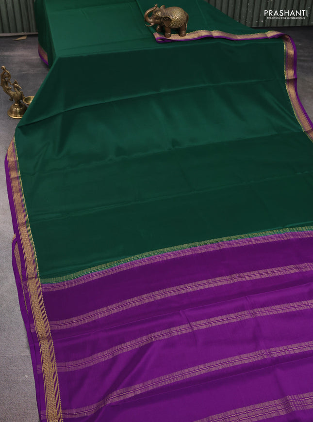 Pure mysore silk saree dark gren and purple with plain body and zari woven border