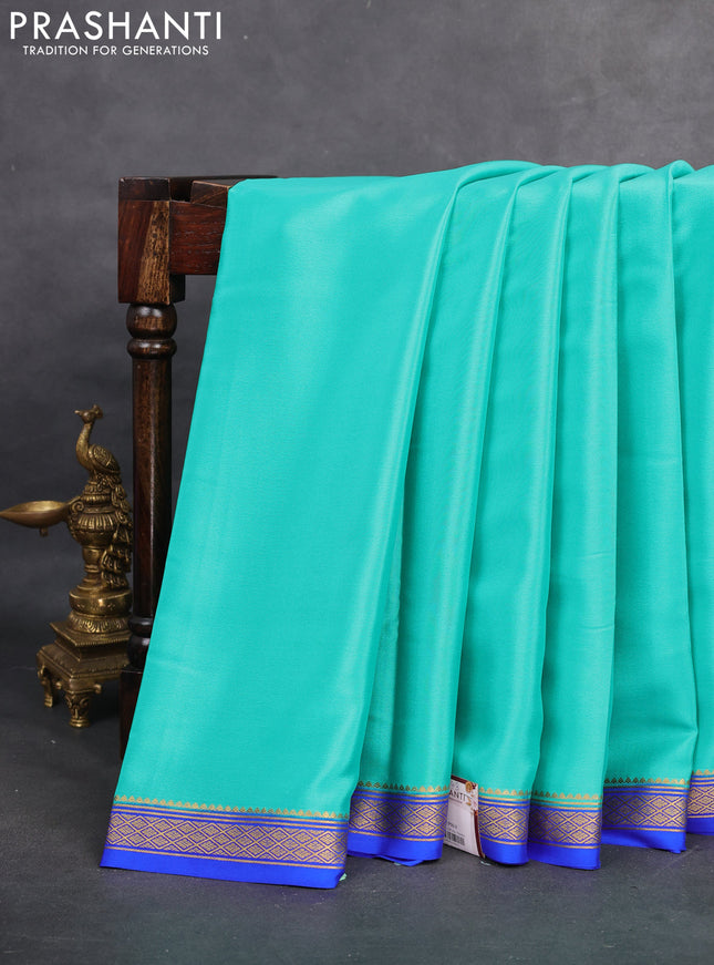 Pure mysore silk saree teal shade and blue with plain body and zari woven border