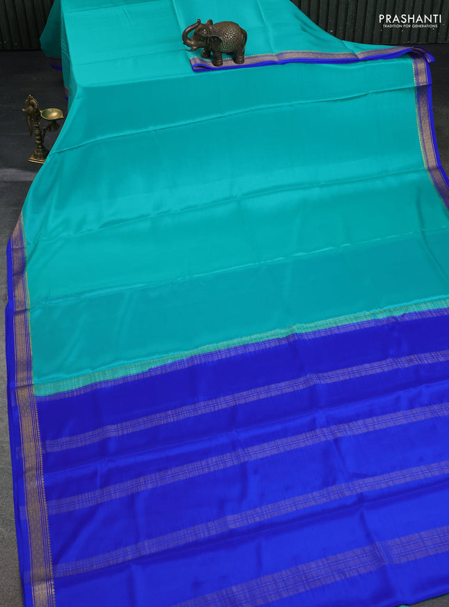 Pure mysore silk saree teal shade and blue with plain body and zari woven border