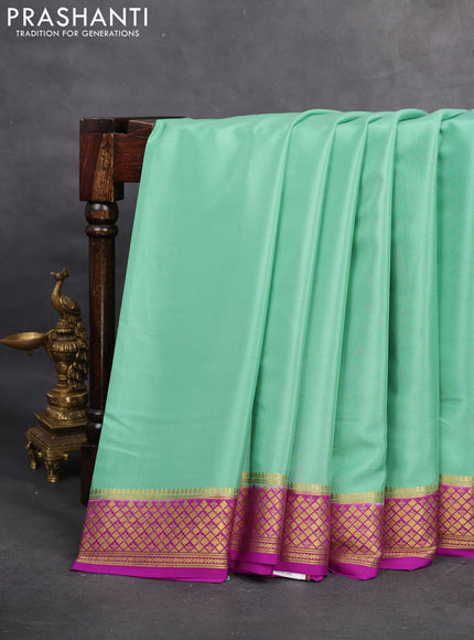 Pure mysore silk saree pastel green and purple with plain body and paisley zari woven border