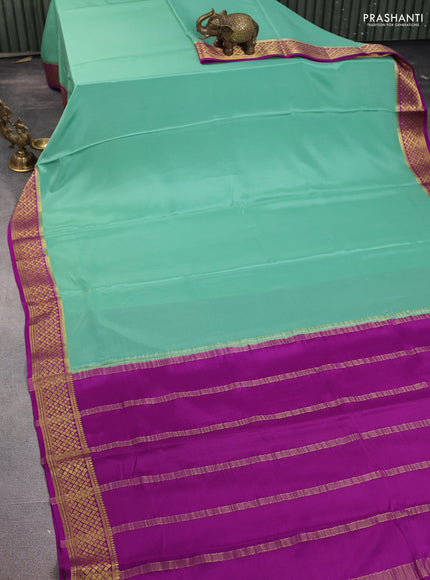 Pure mysore silk saree pastel green and purple with plain body and paisley zari woven border