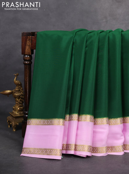 Pure mysore silk saree bottle green and lotus pink with plain body and rettapet zari woven border