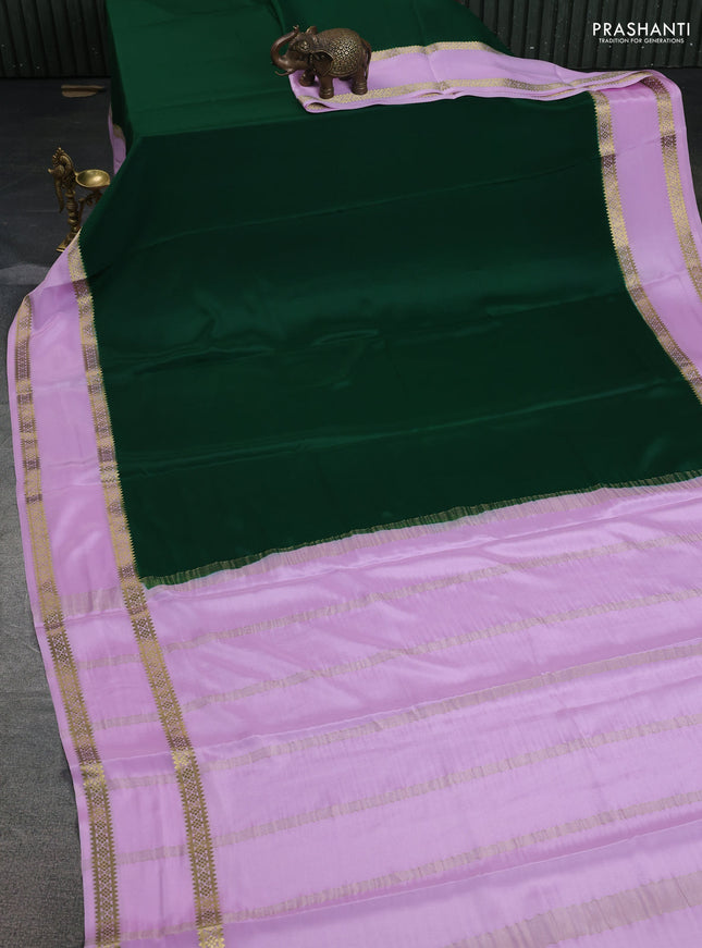 Pure mysore silk saree bottle green and lotus pink with plain body and rettapet zari woven border