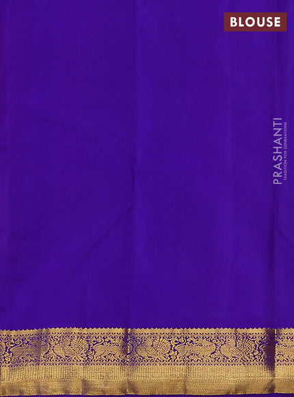 Pure kanchipuram silk saree peach pink and violet with zari woven buttas and zari woven korvai border
