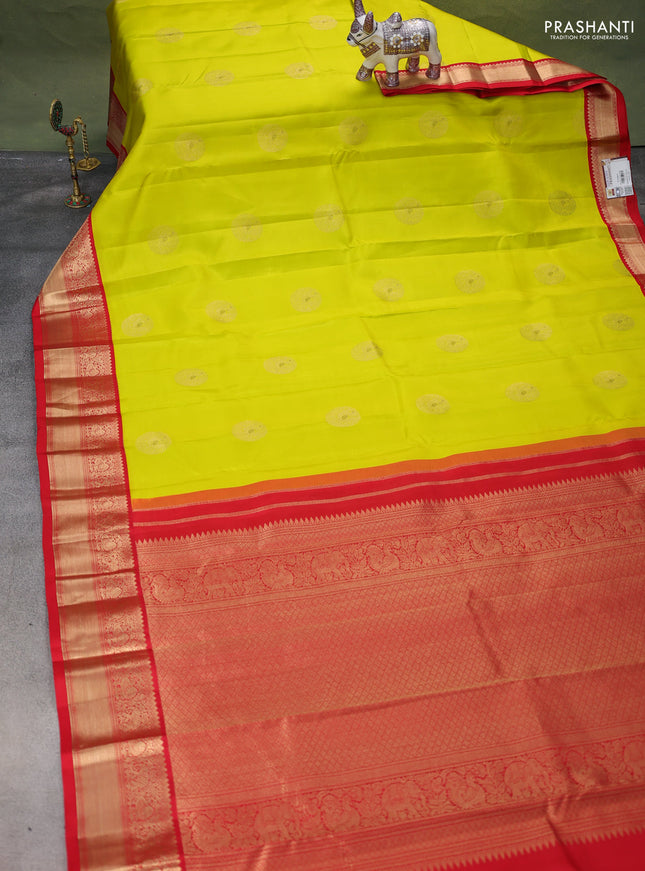 Pure kanchipuram silk saree lime yellow and red with zari woven buttas and zari woven korvai border