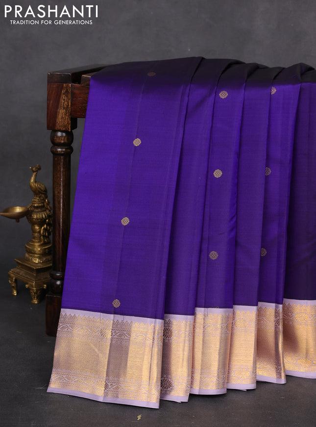 Pure kanchipuram silk saree blue and pastel lavender with zari woven buttas and zari woven korvai border