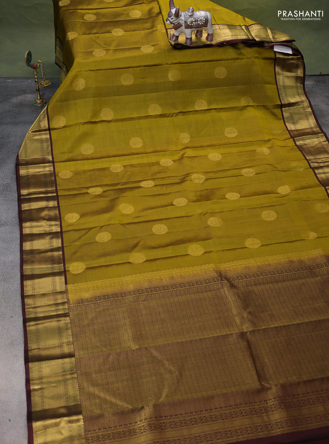 Pure kanchipuram silk saree mehendi green and coffee brown with zari woven buttas and zari woven border