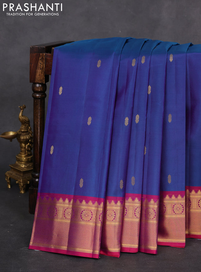Pure kanchipuram silk saree dual shade of bluish green and dual shade of purple with zari woven buttas and zari woven border