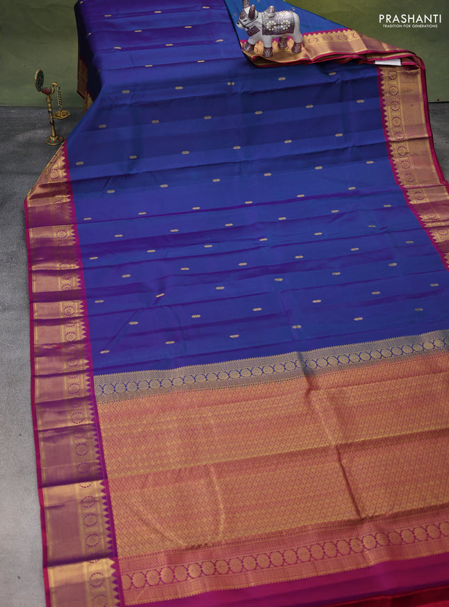 Pure kanchipuram silk saree dual shade of bluish green and dual shade of purple with zari woven buttas and zari woven border