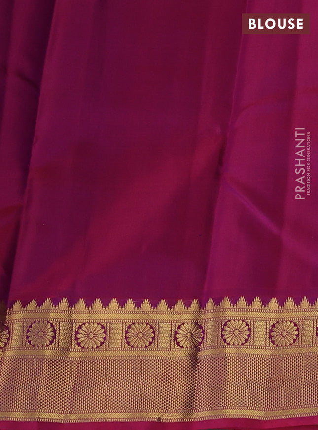 Pure kanchipuram silk saree dual shade of bluish green and dual shade of purple with zari woven buttas and zari woven border