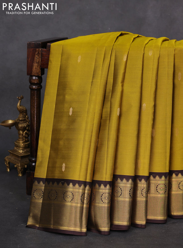 Pure kanchipuram silk saree mehendi green and coffee brown with zari woven buttas and zari woven border
