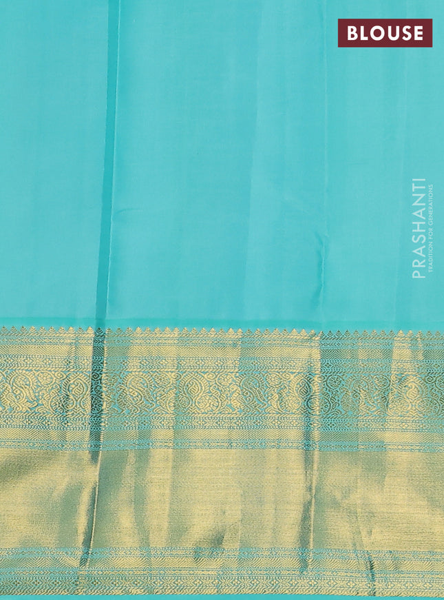 Pure kanchipuram silk saree dual shade of pinkish orange and teal shade with zari woven buttas and long zari woven korvai border