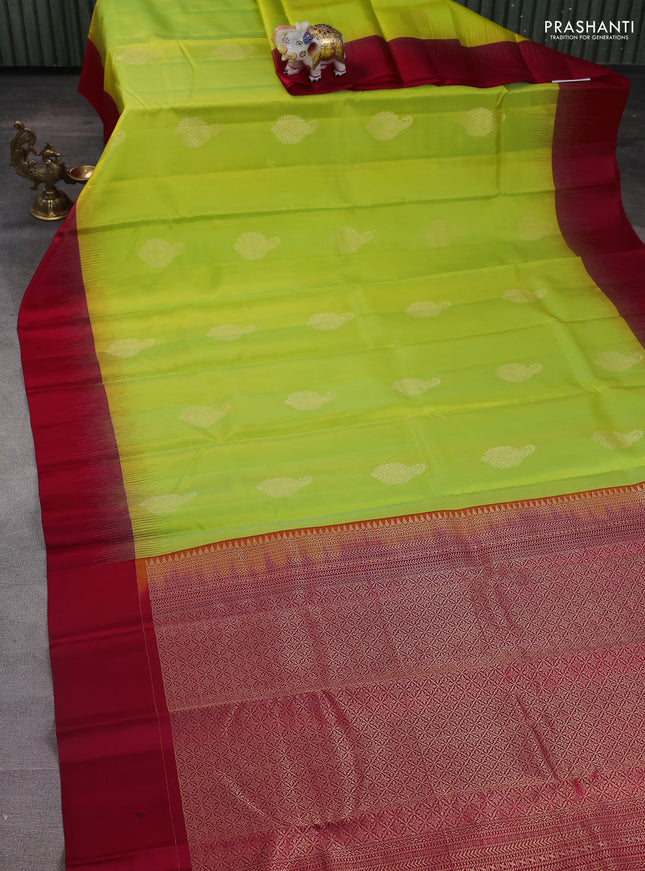 Pure kanchipuram silk saree dual shade of light green and red with zari woven buttas and simple border