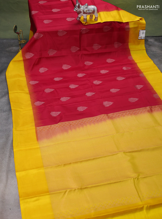 Pure kanchipuram silk saree reddish pink and yellow with silver zari woven buttas and simple border
