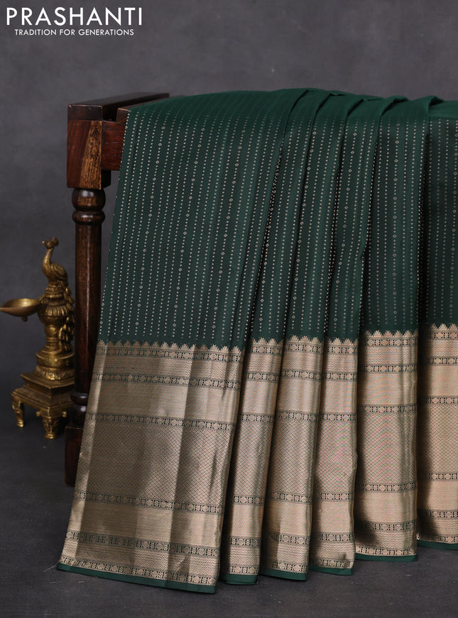 Pure kanchipuram silk saree bottle green and peach pink with allover zari weaves and long zari woven border