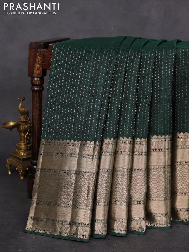 Pure kanchipuram silk saree bottle green and peach pink with allover zari weaves and long zari woven border