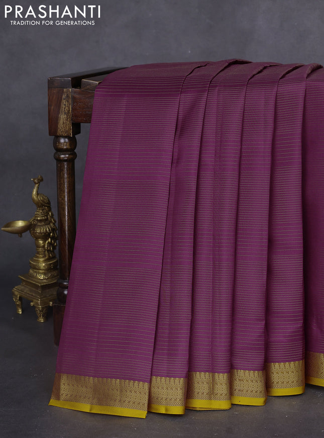 Pure kanchipuram silk saree mauve pink and yellow with allover zari stripe pattern and zari woven border