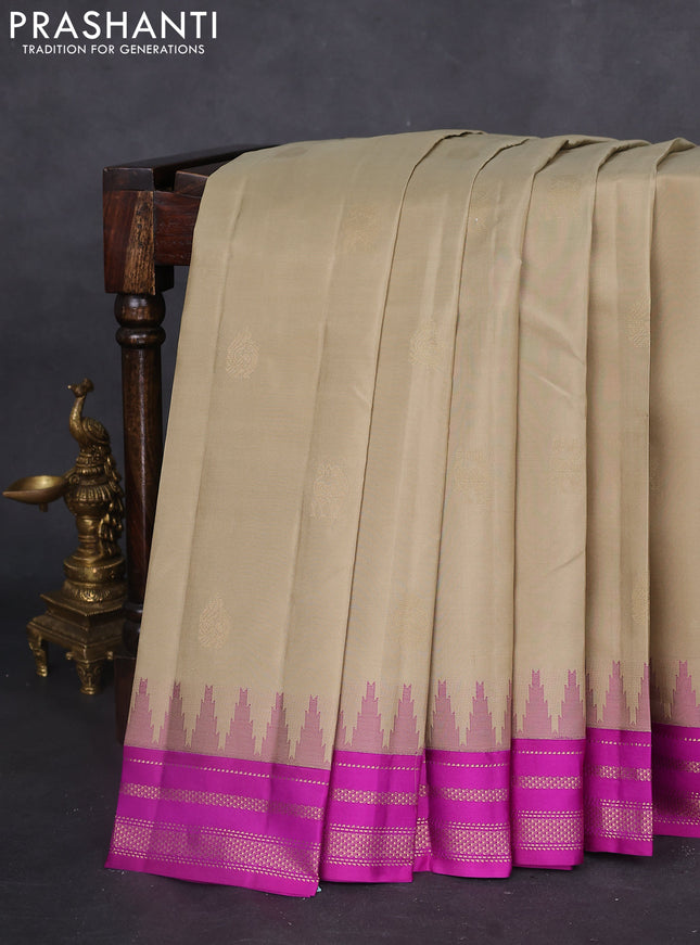 Pure kanchipuram silk saree khaki shade with zari woven buttas and ganga jamuna border