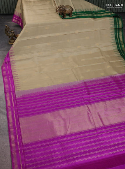 Pure kanchipuram silk saree khaki shade with zari woven buttas and ganga jamuna border