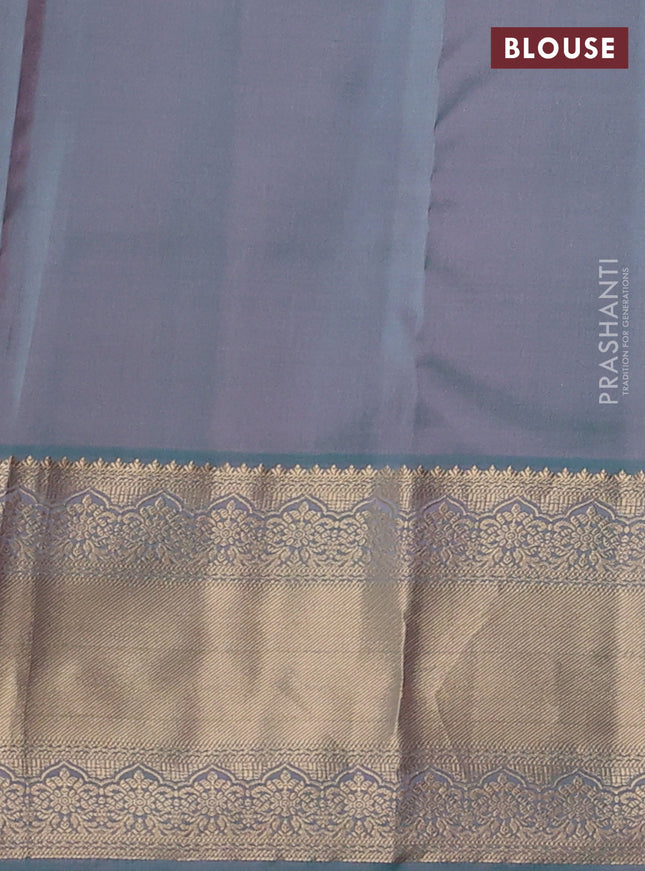 Pure kanchipuram silk saree peach shade and dual shade of teal blue with allover zari weaves & buttas and long zari woven border