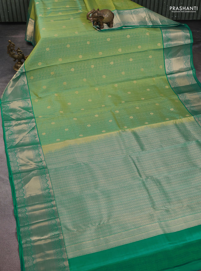 Pure kanchipuram silk saree dual shade of green and teal green with allover zari weaves & buttas and long zari woven border