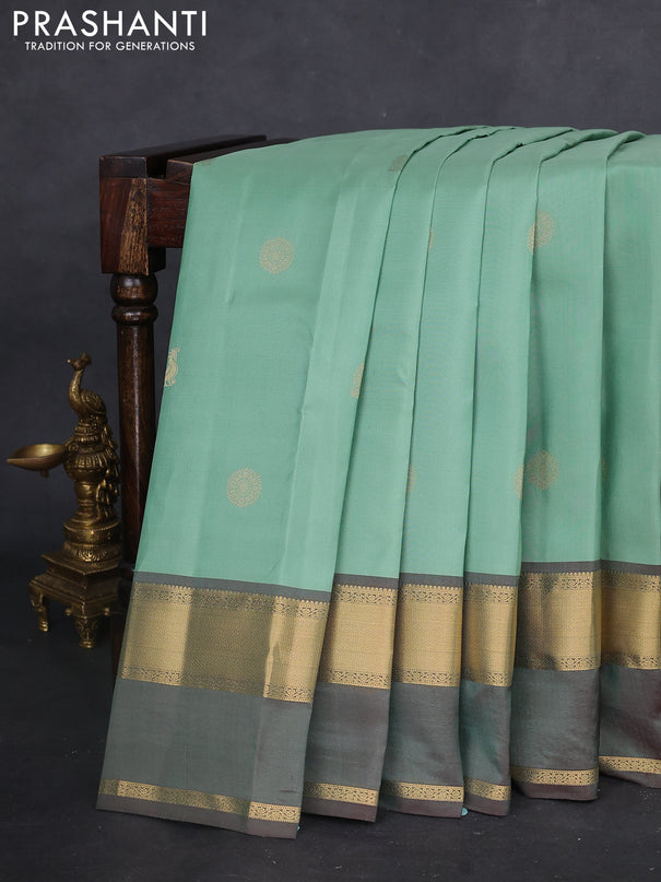 Pure kanchipuram silk saree pastel green and dual shade of maroon with zari woven buttas and long rettapet zari woven border