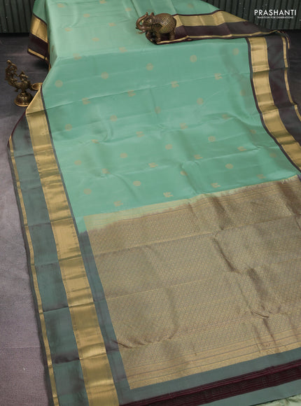 Pure kanchipuram silk saree pastel green and dual shade of maroon with zari woven buttas and long rettapet zari woven border