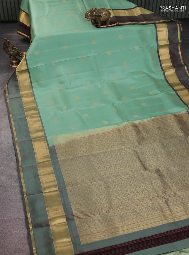Pure kanchipuram silk saree pastel green and dual shade of maroon with zari woven buttas and long rettapet zari woven border