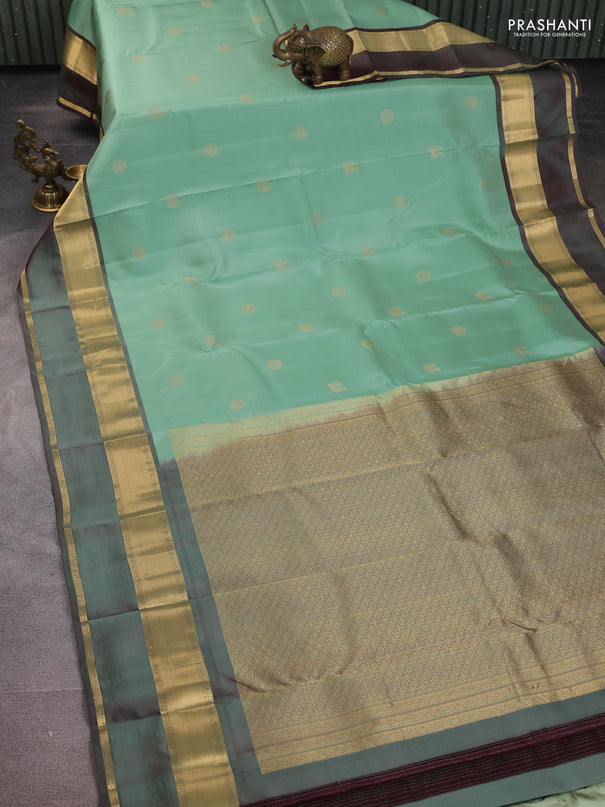 Pure kanchipuram silk saree pastel green and dual shade of maroon with zari woven buttas and long rettapet zari woven border